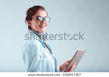 oung researcher in lab coat and glasses, smiling and looking up from her tablet, provides factual clarity and guidance for informed decisions