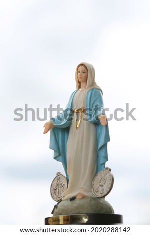 Our lady of Miraculous medal virgin Mary catholic religious statue