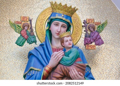 Our lady of Perpetual help catholic religious statue - Shutterstock ID 2082512149