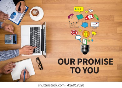 OUR PROMISE TO YOU  Business Team Hands At Work With Financial Reports And A Laptop