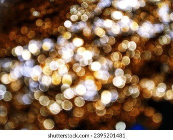 Out of Focus, Defocused, Blurred, Abstract and Bokeh of Sparkling Gold Lights, Suitable for Background Use - Shutterstock ID 2395201481
