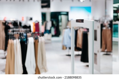 Out of focus entrance to boutique clothing store in supermarket. Selective focus on frame electronic article surveillance. - Shutterstock ID 2188098835