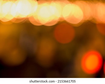 out of focus image of torchlights at night