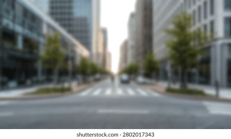 Out of focus view of an empty urban street flanked by tall office buildings and green trees under a bright sky