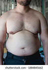 An Out Of Shape Torso, Large Belly, Man Boobs, Some Chest Hair And Slight Body Acne. Overweight And Slightly Obese. Light Complexion.