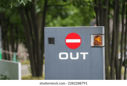 Out traffic sign on the exit way from a public parking place. Forbidden entrance, denied. - Shutterstock ID 2282288791