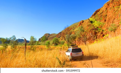 Outback Australia - Road Trip Driving A 4x4 Four Wheel Drive Jeep Off Road Through Dirt Track To Camping Spot Near Lake Argyle - Ord River Irrigation Scheme; East Kimberley Town Of Kununurra