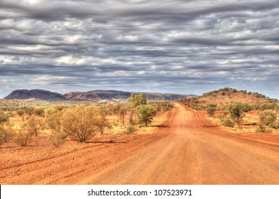 Outback Travel, Red Centre of Australia, dirt road near Hermannsburg/Alice Springs, Northern Territory, Australia