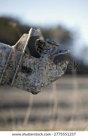 outboard motor covered in barnacles