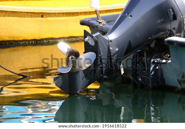 Outboard
motor propeller. Boat in the port of Tel
Aviv.