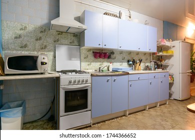 Outdated Kitchen Interior With A Hundred Finishes And A Simple Kitchen Set