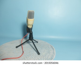 Outdated Looking Microphone With Red Wire