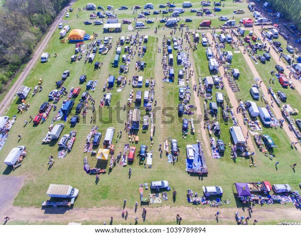 outdoor aerial car\
boot sale view from above\

