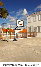 Outdoor Basketball Court In A Public School