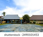 Outdoor basketball court in a school. Background of empty basketball court