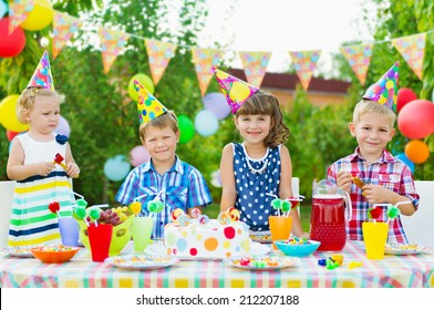 Outdoor Birthday Party For Toddlers With Colorful Cake