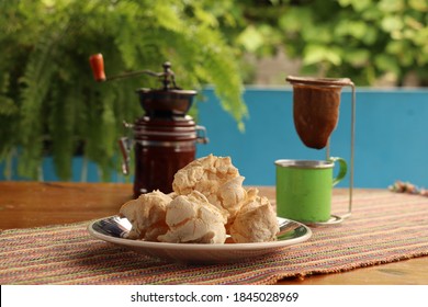 Outdoor Breakfast Table, Cookies, Coffee On The Table, Green Mug With Coffee Brewed In Cloth Strainer