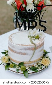 Outdoor Bridal Shower Cake And Bouquet Of Roses