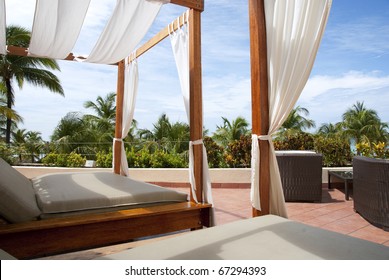 Outdoor Cabana Bed At A Caribbean Resort. 1st Person Perspective.