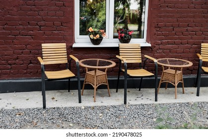 Outdoor Cafe With Flowers. Street Restaurant. No People.