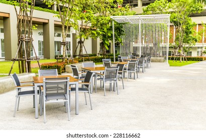 Outdoor cafe in front of condominium