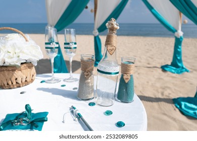 outdoor ceremony, wedding decor, bottle for colored sand, beach wedding, wedding decor, table for outdoor ceremony, signing documents for marriage registration - Powered by Shutterstock