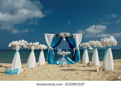 outdoor ceremony, wedding decor, bottle for colored sand, beach wedding, wedding decor, table for outdoor ceremony, signing documents for marriage registration - Powered by Shutterstock