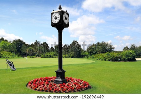 Outdoor Clock Post on golf course with green spring valley on the background