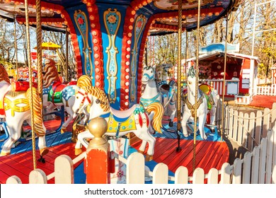 Outdoor Colourful Vintage Flying Horse Carousel In The Park