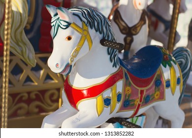 Outdoor Colourful Vintage Flying Horse Carousel In The Park