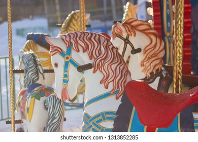 Outdoor Colourful Vintage Flying Horse Carousel In The Park