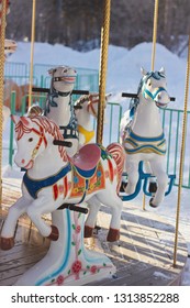 Outdoor Colourful Vintage Flying Horse Carousel In The Park