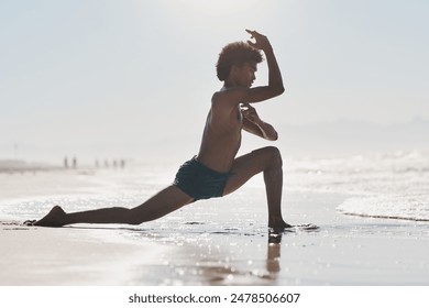 Outdoor, dancer body and black man by sea with stretching leg, muscle warm up and sunshine for summer travel. African guy, creative dancing and flexible with beach vacation, energy and sand in Brazil - Powered by Shutterstock