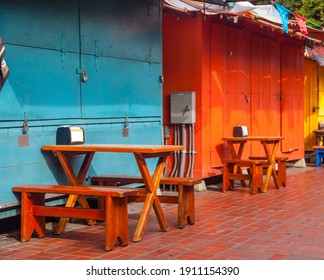 Outdoor Dining Area With Table And Seats In Downtown