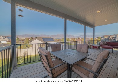 Outdoor Dining Furniture On A Covered Patio