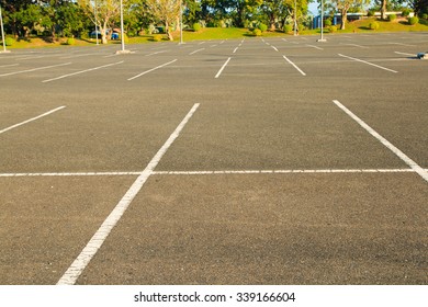 Outdoor empty parking lot with blue skies