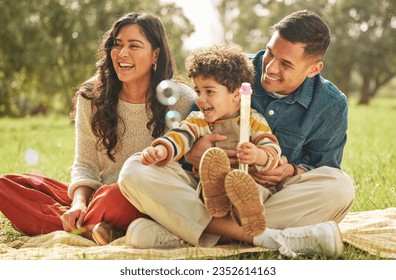 Outdoor, family and parents with bubbles, child and happiness with summer vacation, excited and relax together. Kid, mother or father with joy, sunshine and garden with a smile, holiday and playing - Powered by Shutterstock