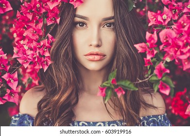 Outdoor Fashion Photo Of Beautiful Young Woman Surrounded By Flowers. Spring Blossom
