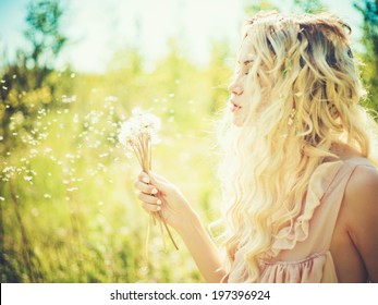 Outdoor Fashion Portrait Of Romantic Blonde With Dandelions