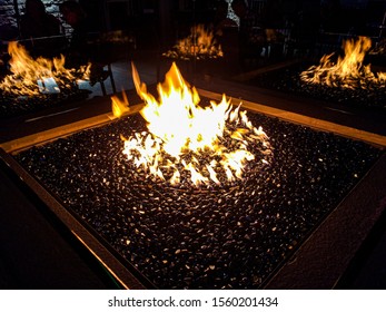 Outdoor Fire Pit With Glass And Black Stones