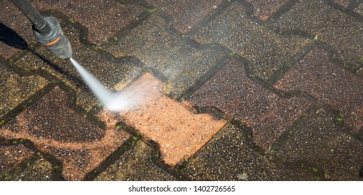 Outdoor Floor Cleaning With A Pressure Water Jet In Banner Panorama Web Template