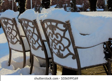 Outdoor Furniture Filled With Snow 