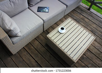 Outdoor Furniture Lounge Group With Chairs, Sofa And Table In A Patio. Seating On The Balcony, Is A Recreation Place.