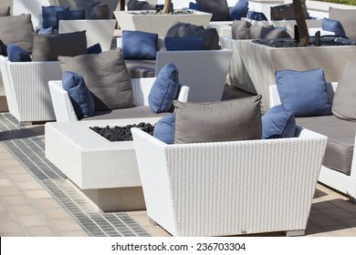 Outdoor Furniture Rattan Armchairs And Table On Terrace 