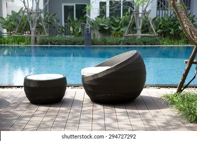 Outdoor Furniture Rattan Chairs And Table On Terrace