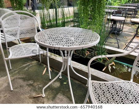Zen Garden Furniture Throughout Outdoor Furniture White Steel Chairs And Table In The Zen Garden Landscape Furniture White Steel Chairs Table Stock Photo edit Now Zen Garden Furniture Throughout Outdoor Furniture White Steel Chairs And Table In The Zen Garden Landscape Furniture White Steel Chairs Table Stock Photo edit Now
