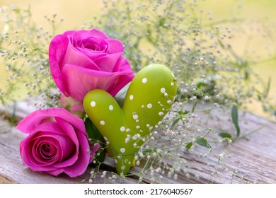 Outdoor Holiday Decoration With Pink Roses And Green Heart