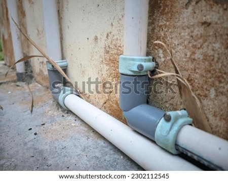 outdoor housing water pipe line leading into the water heater machine in the bathroom