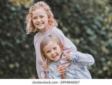 Outdoor, laugh and siblings in portrait with hug, playful and bonding together with childhood games in park. Garden, children or girls with embrace with happiness, development and caring in backyard - Powered by Shutterstock