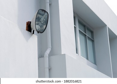 Outdoor Lights On The Wall Of The Building. Large Outdoor Light For Building. LED Flood Light, Spot Light For A Building. Electrical Light At Night.